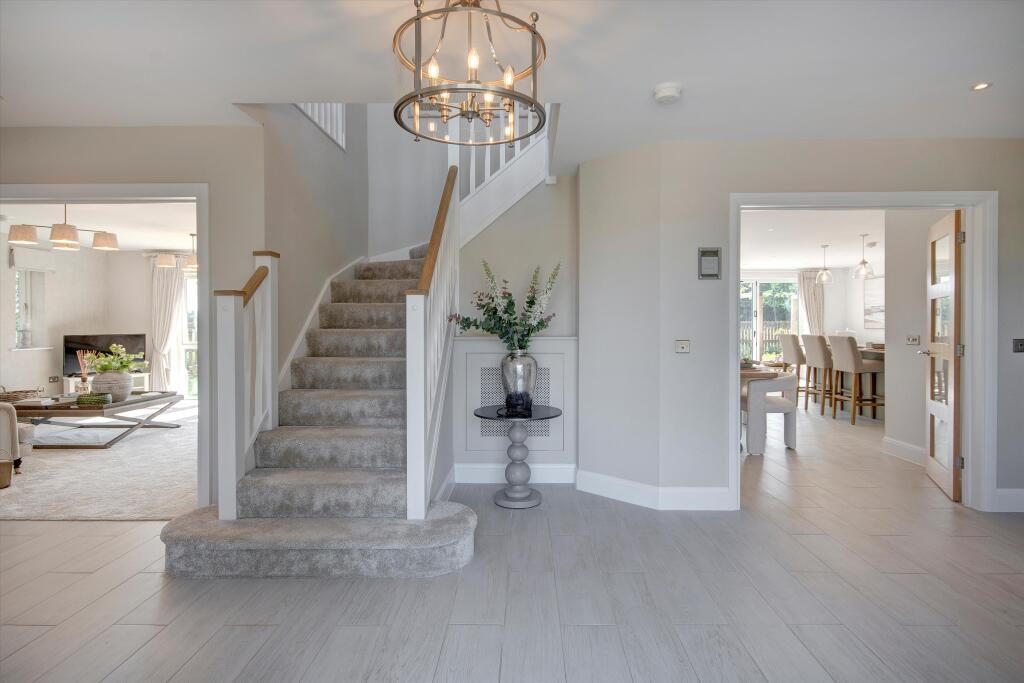 Source listing photo: entrance hallway of a new-build home