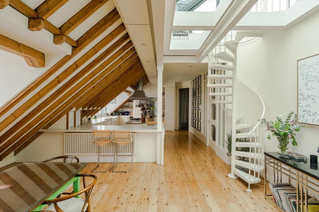 Converted loft room shown in a property video